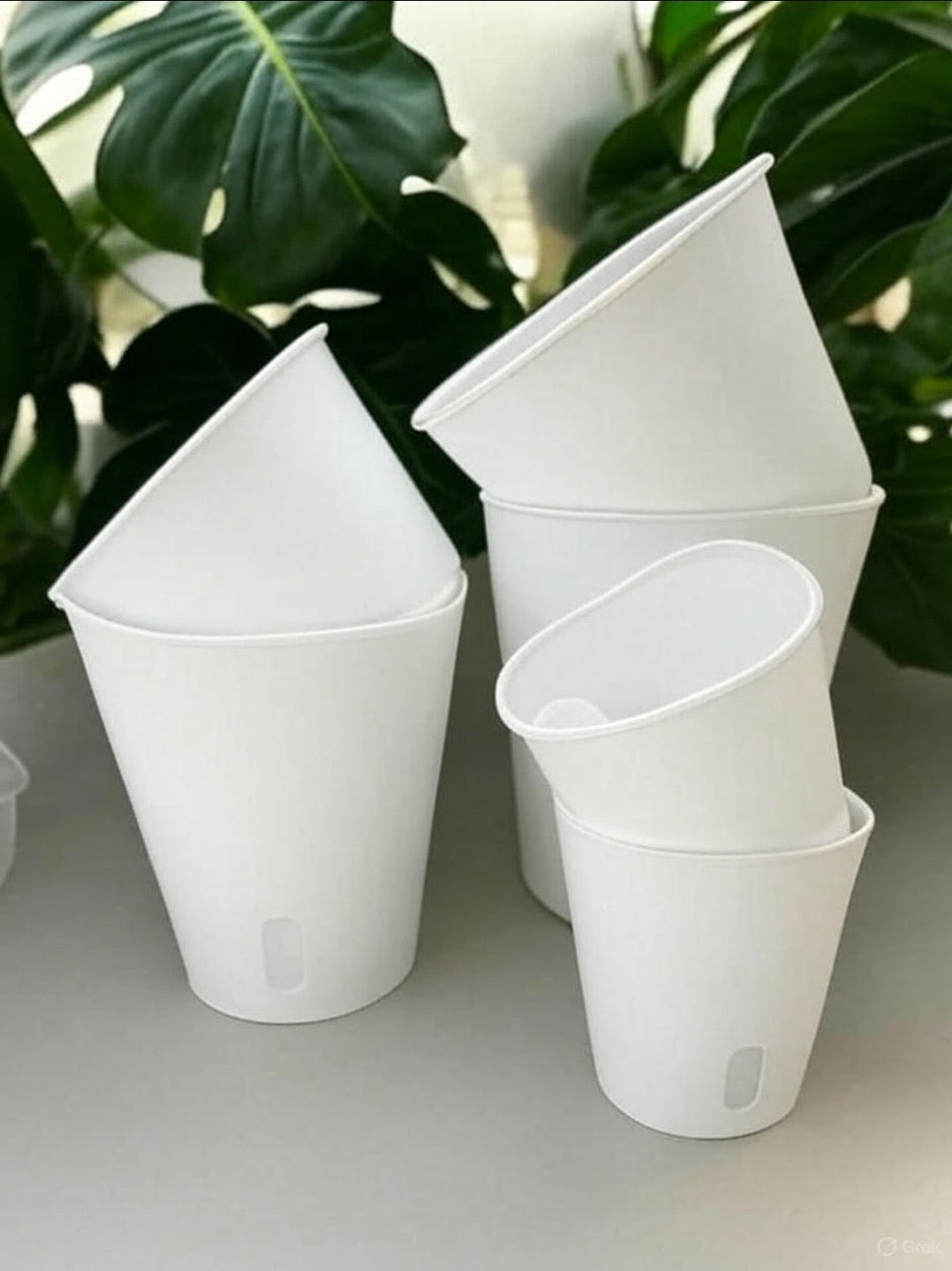 Self watering plant pots